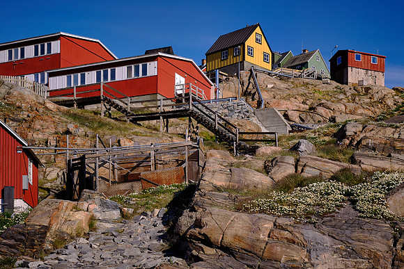 Uummannaq is located at 70º 40’N 52º 08′ W so  the sun never sets in summer.