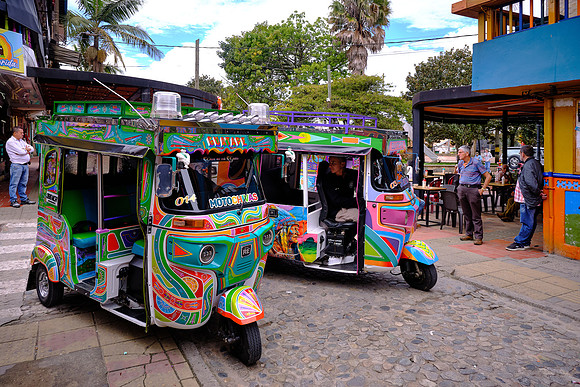 All of the tuk-tuks in town are brightly decorated.