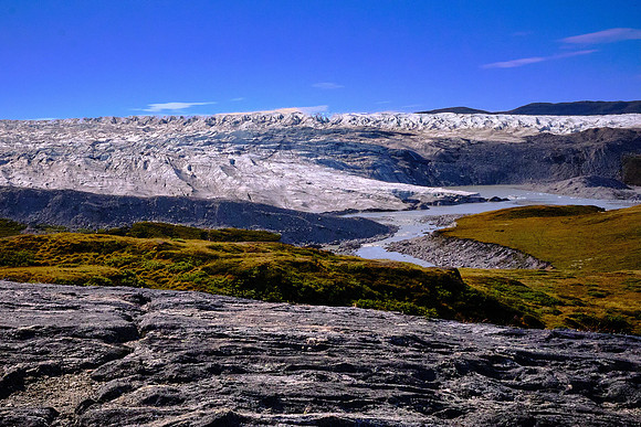 The ice sheet is, on average, 1.0 mile thick and over 1.9 miles thick at its maximum.