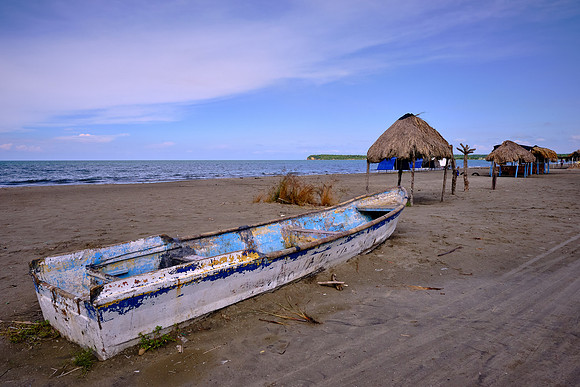 Some of the village fishing boats need a bit of work.