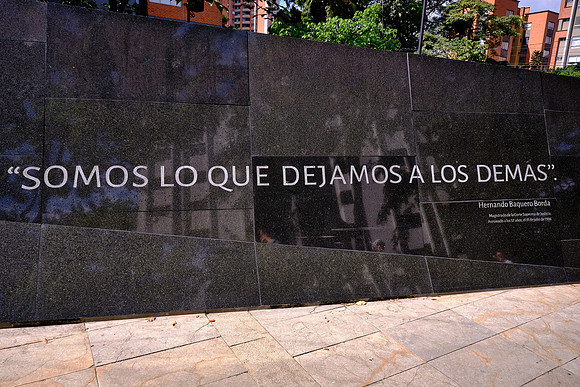 "We are what we leave to others."   This  wall has 46,612 small holes representing  each of the victims that lost their lives from 1983-94.